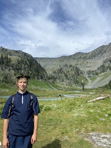 A person looking at a modern news dashboard on a tablet